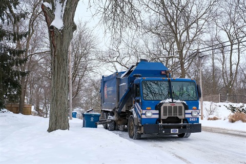 Recycling truck in winter